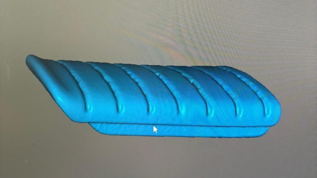 High-resolution 3D scan of an original Triumph T2080227 footrest rubber used as the reference for reverse engineering.
